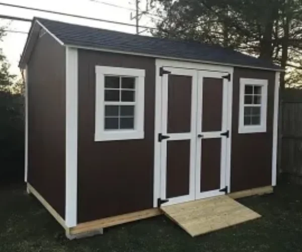 buy-or-build-a-shed-jpg-300x225 Custom storage shed featuring an elegant white and brown paint combination.
